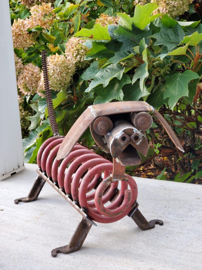 Scrap metal dog